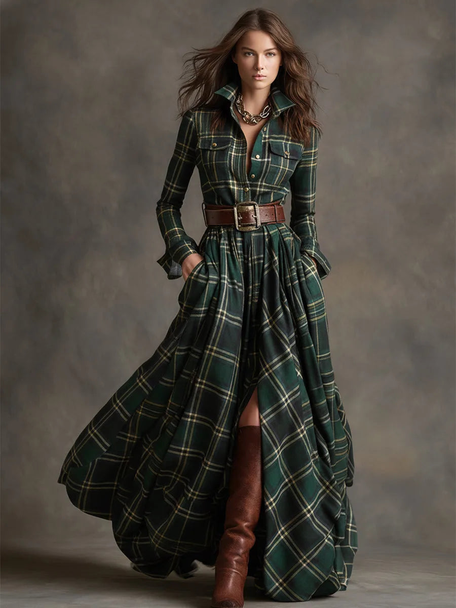 Side angle of the pleated tartan maxi skirt swaying with visible front slit and leather boots