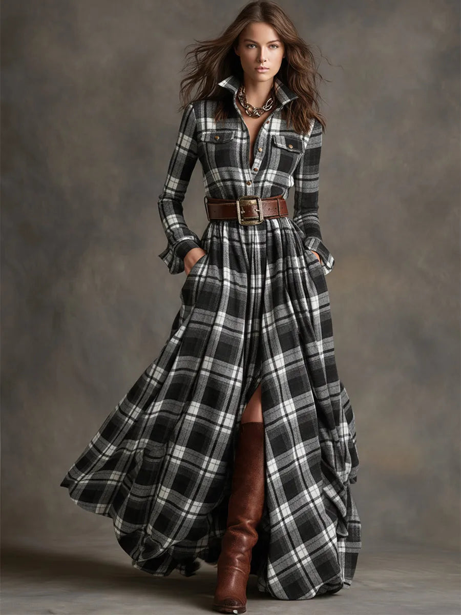 Close-up of the wide brown leather belt with brass buckle cinching the plaid shirt dress waist