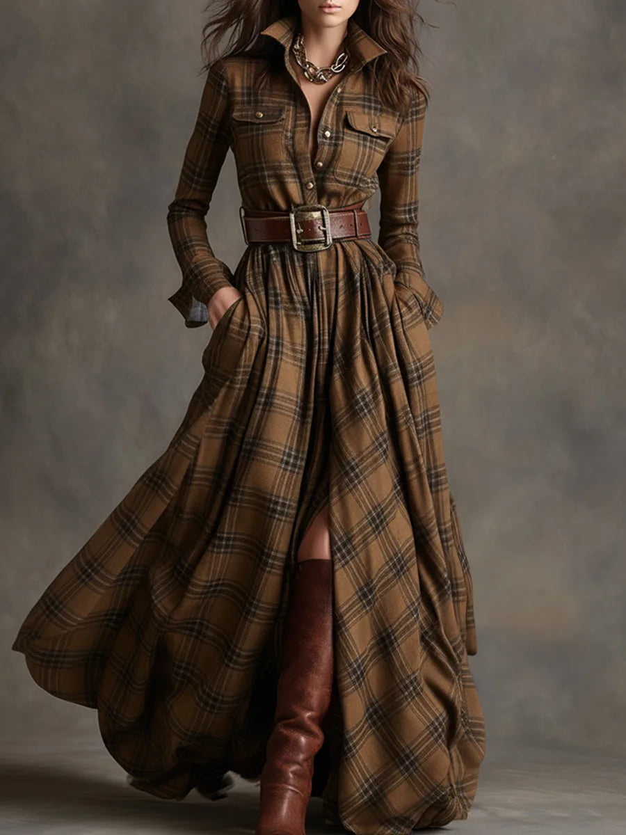 Close-up of chest pocket detail and brass button closure on the plaid shirt dress bodice