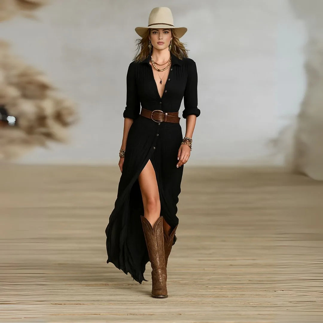 Front view of black long-sleeve belted shirt dress with deep button placket, leg slit and brown leather waist belt