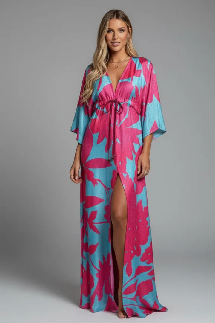 Full-length front view of the light green maxi dress highlighting the flowing kimono sleeves and ankle-length hem