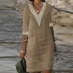 Khaki linen-look midi dress featuring a crochet V-neckline and lace-trimmed half sleeves
