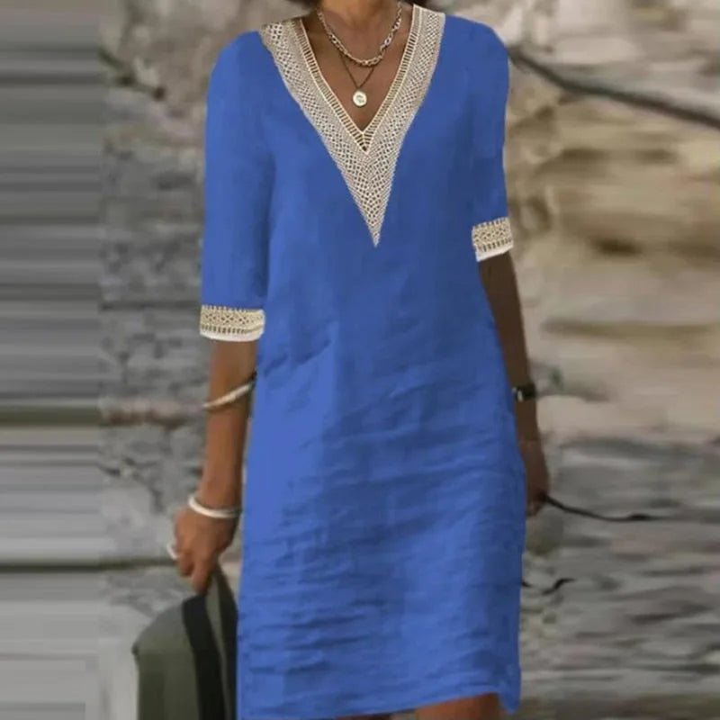 Blue midi dress with crochet V-neck panel and lace-trimmed sleeves, relaxed shift silhouette