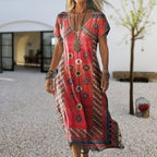 Close-up front view of the beige floral print maxi dress showing the V-neckline and sleeve detail