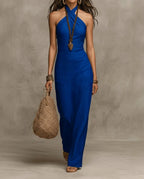 Royal blue linen halter maxi dress, close view of the criss-cross halter tie and fitted waist
