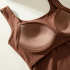 Flat lay close-up of the built-in shelf bra with underwire-style support cups in brown