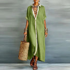 Model wearing a green button-down maxi shirt dress with contrast collar and placket, full-length front view