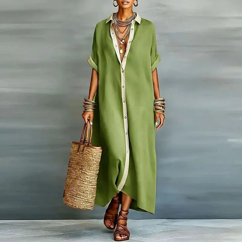 Model wearing a green button-down maxi shirt dress with contrast collar and placket, full-length front view