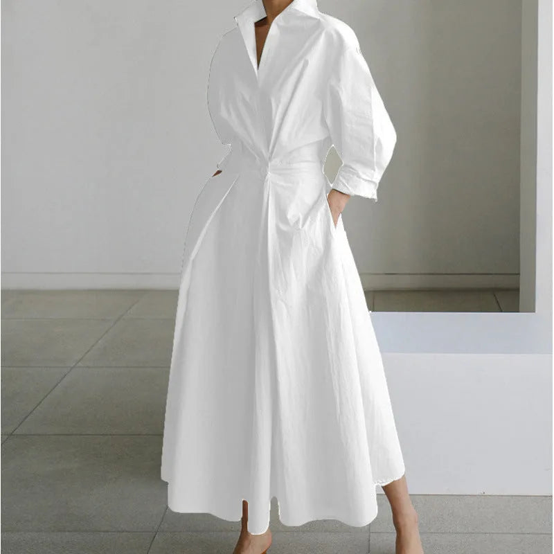 Full length view of the maxi shirt dress highlighting the long hemline and wide skirt silhouette