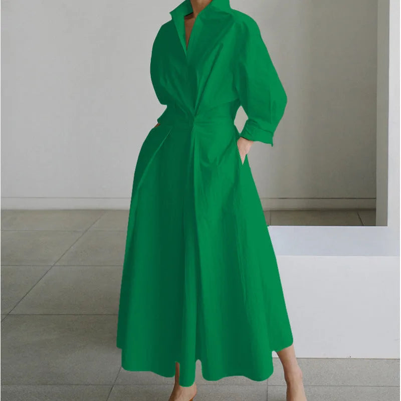 Solid green collared maxi shirt dress with cinched waist tie and full flowing skirt