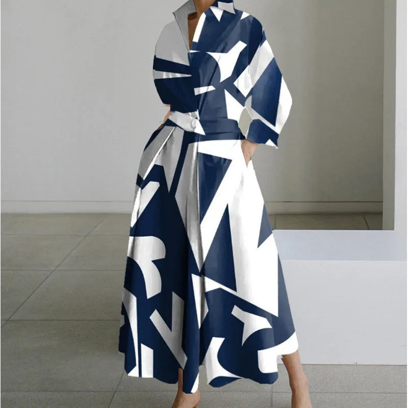 Navy and white geometric print maxi shirt dress with collared neckline and twisted waist tie