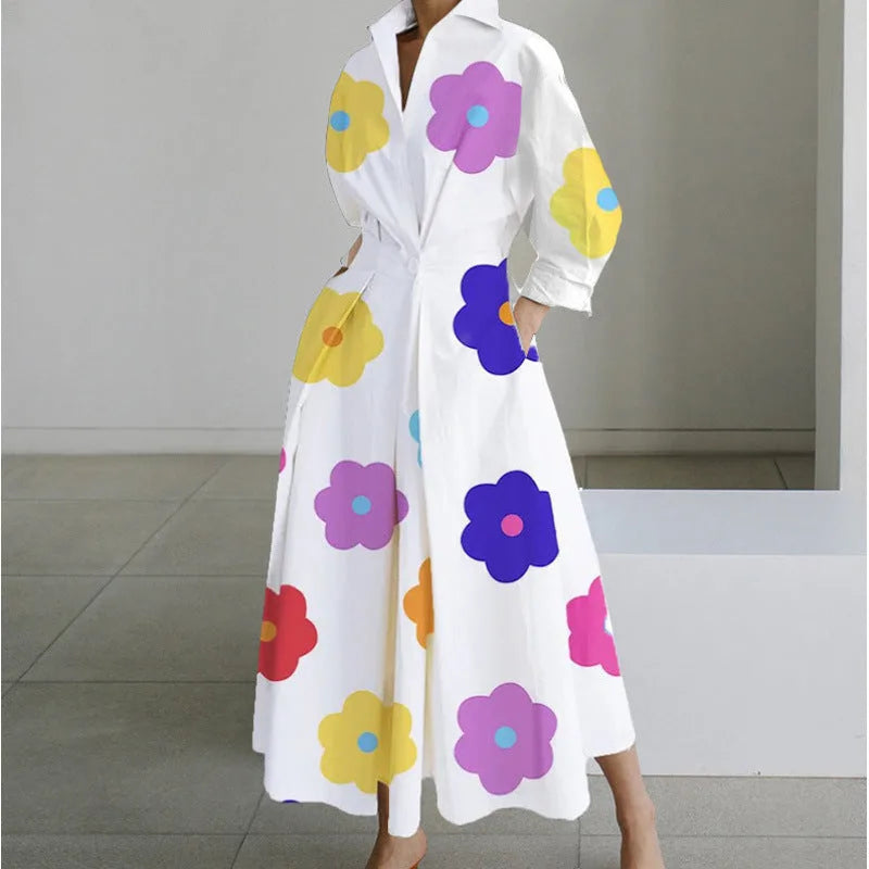 White maxi shirt dress with large multicolour flower print and relaxed collared silhouette