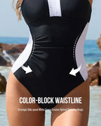 Close-up of the ruched side waistline with white colour-block panel creating a slimming effect