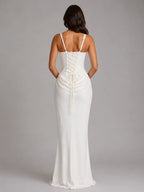 Back view of the ivory white dress showing adjustable straps and lace-up corset back detail