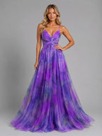 Model in a purple watercolour floral version of the maxi dress with adjustable spaghetti straps
