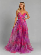 Model wearing the pink and magenta watercolour floral gown with fitted waist and flowing A-line skirt