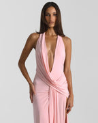 Three-quarter view showing the flowing train and soft jersey drape of the maxi dress skirt