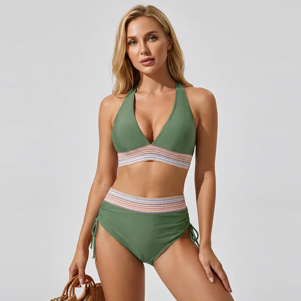 Green halter bikini set with contrast striped waistband, worn with a woven straw tote bag