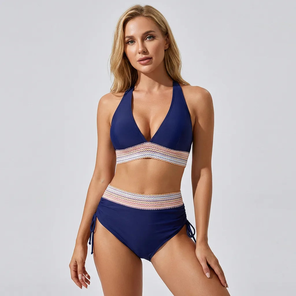 Dark blue halter neck bikini set with striped contrast waistband and adjustable side-tie bottoms