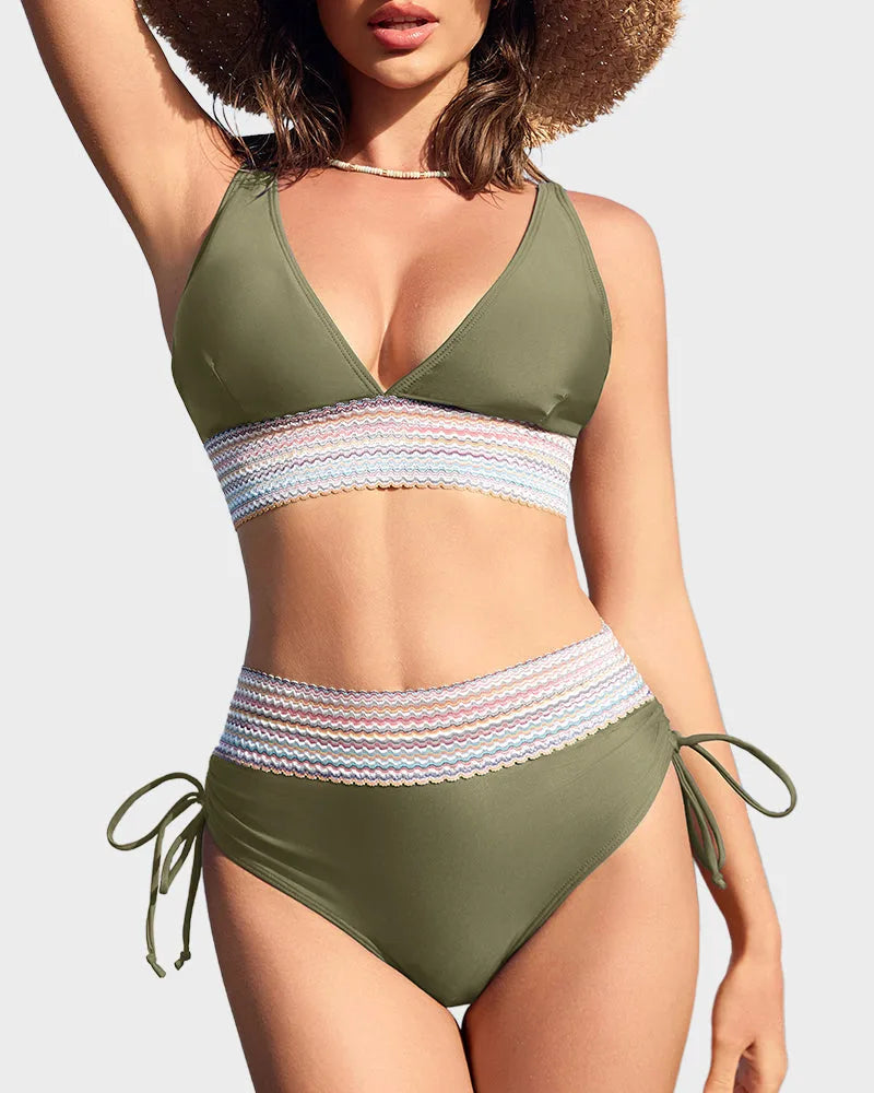 Close-up front view of olive green bikini set on plain background showing woven striped trim and side ruching detail