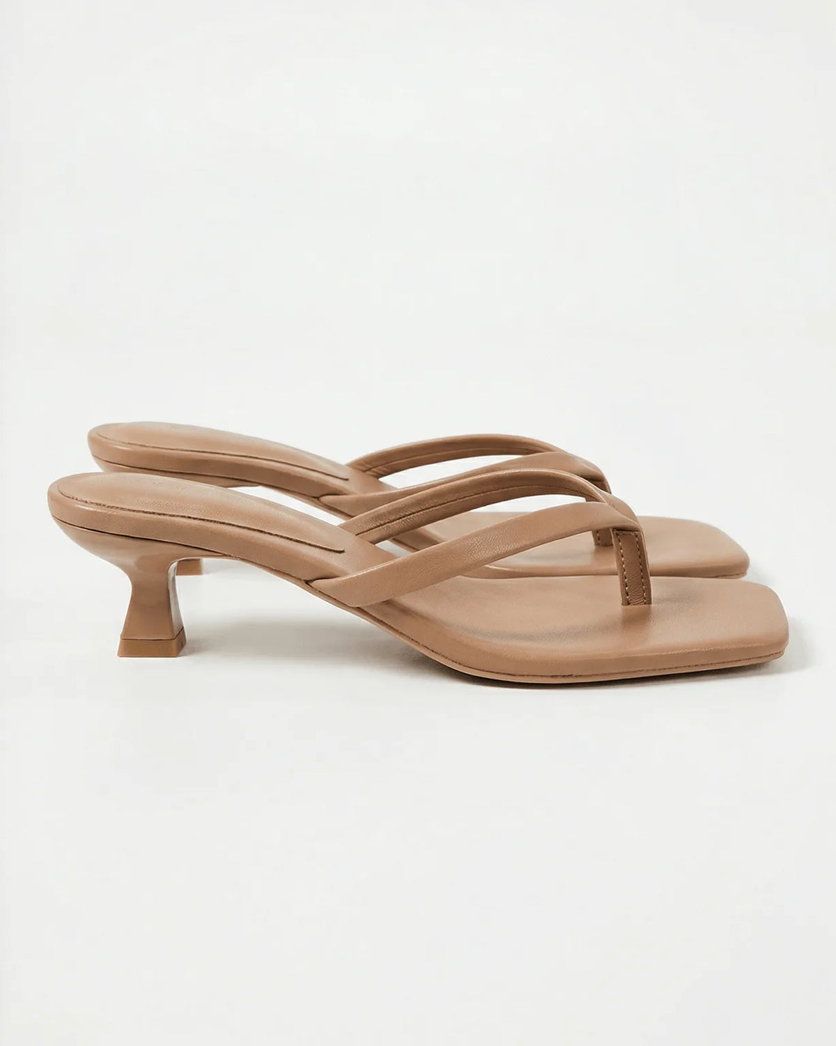 Khaki tan leather thong sandals with thin crossover straps and square toe design