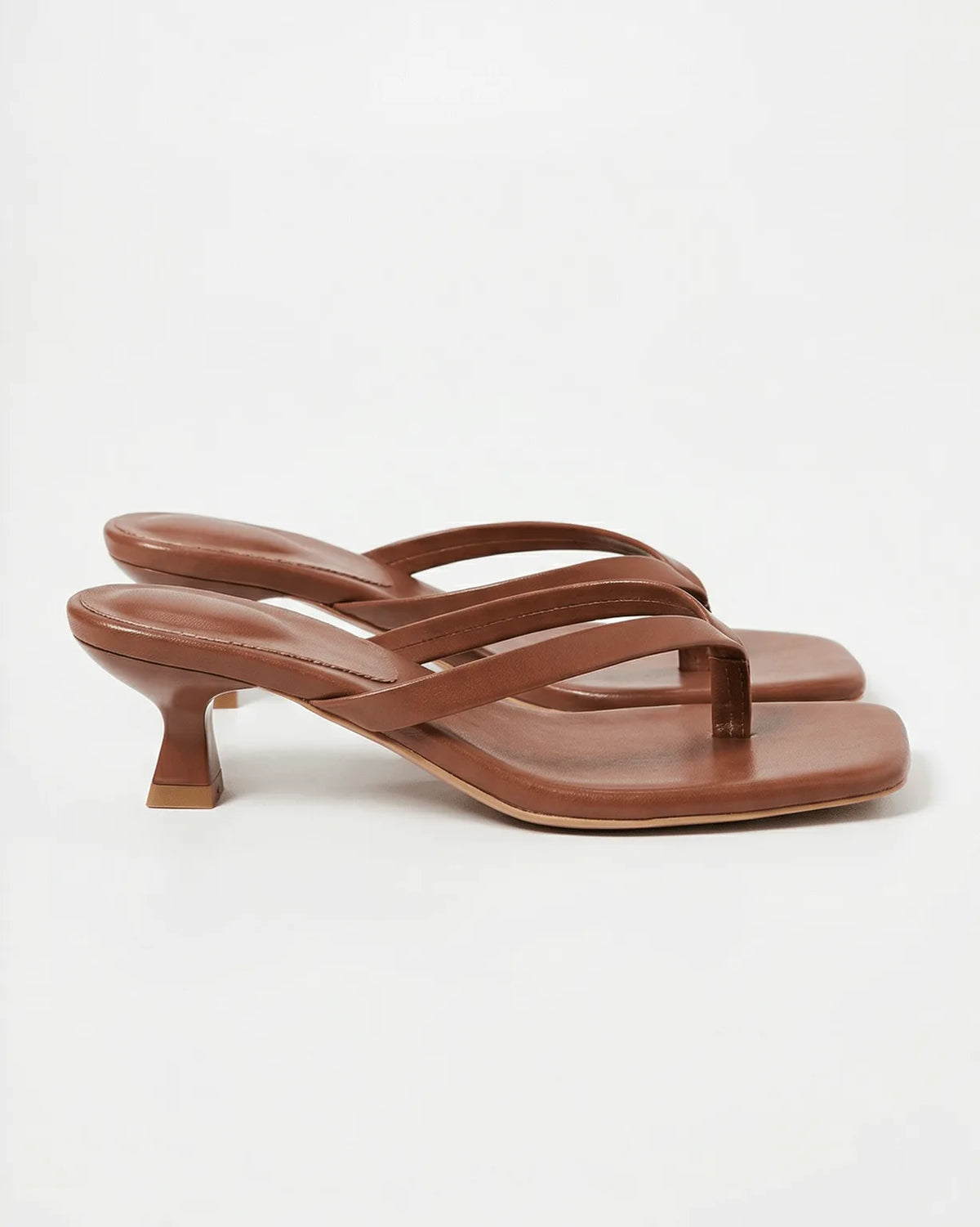 Brown leather thong sandals with square toe and stable flared spool heel