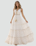 Full-length front view showing the tiered boho maxi skirt flowing to the floor with scalloped lace hem