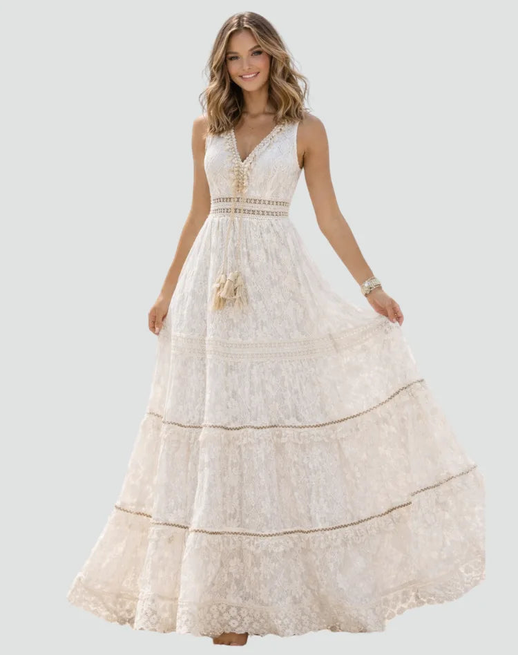 Full-length front view showing the tiered boho maxi skirt flowing to the floor with scalloped lace hem
