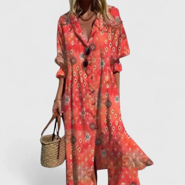 Collared maxi shirt dress in a coral and terracotta tribal print with pintuck bodice detail and a flowing hemline