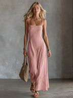 Pink textured maxi dress with diamond-pattern stitching, close front view showing thin straps and square neckline