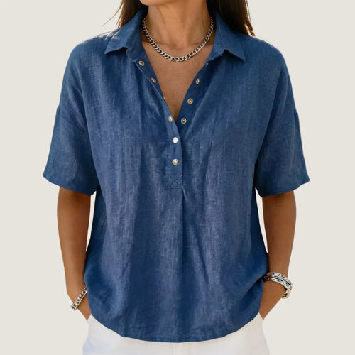 Close-up front view of a navy blue linen-look blouse with collared neckline and button placket