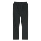 Front angled view of light blue linen pants showing drawstring tie detail at the waist