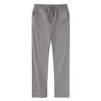 Close-up of black linen pants waistband showing drawstring and elastic construction