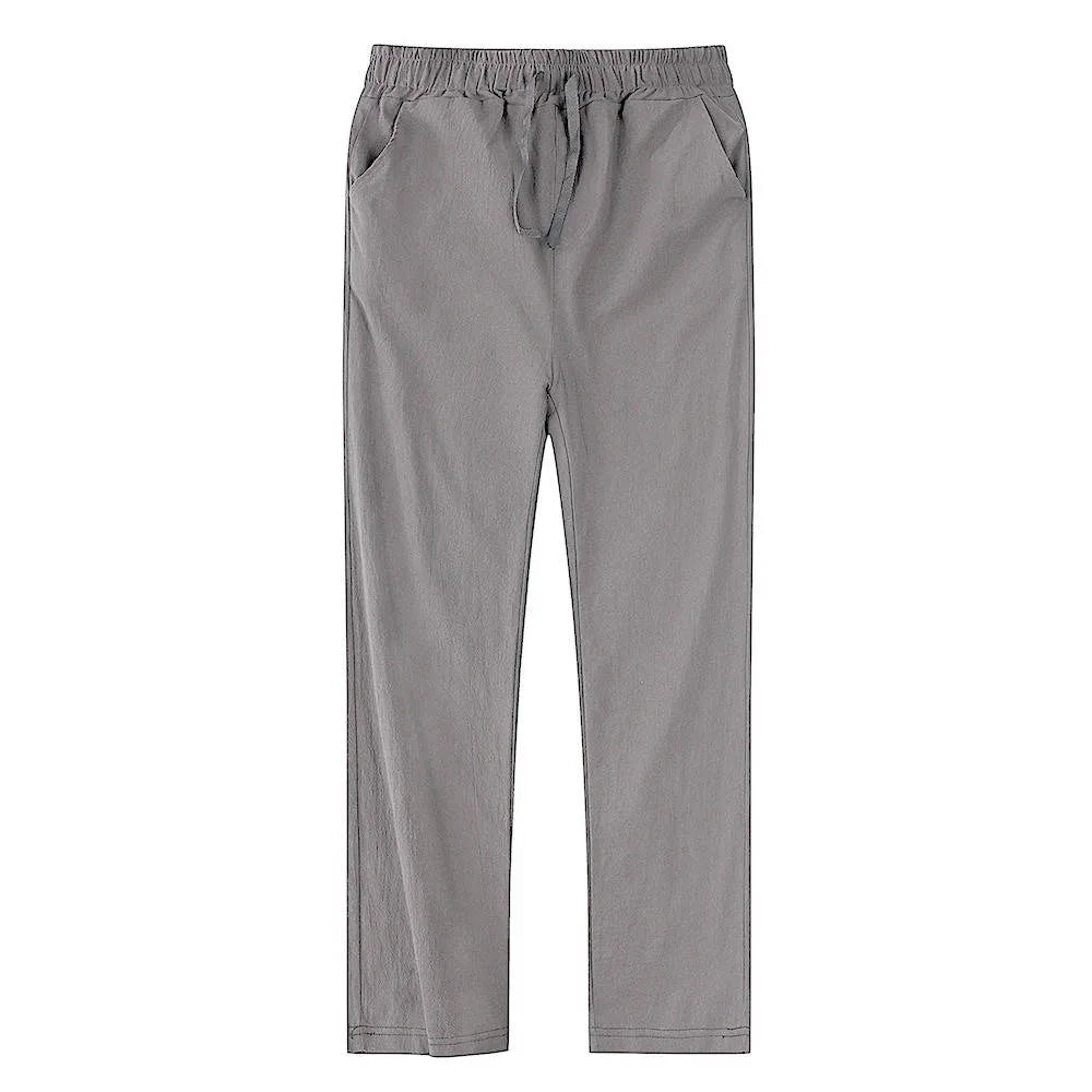 Close-up of black linen pants waistband showing drawstring and elastic construction