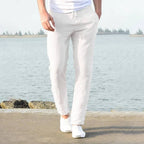 Front view of light blue linen pants showing natural fabric drape and relaxed fit through the thigh