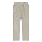 Flat lay front view of light khaki linen pants showing elastic waistband and drawstring closure