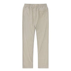 Flat lay back view of light khaki linen pants showing the single back patch pocket
