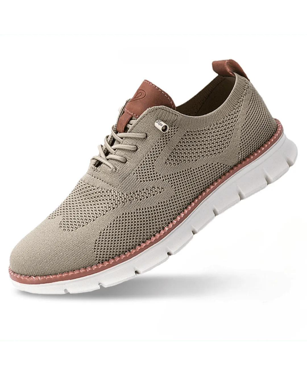 Beige knit sneaker shown at an angle, highlighting the tan leather heel pull tab and white chunky sole