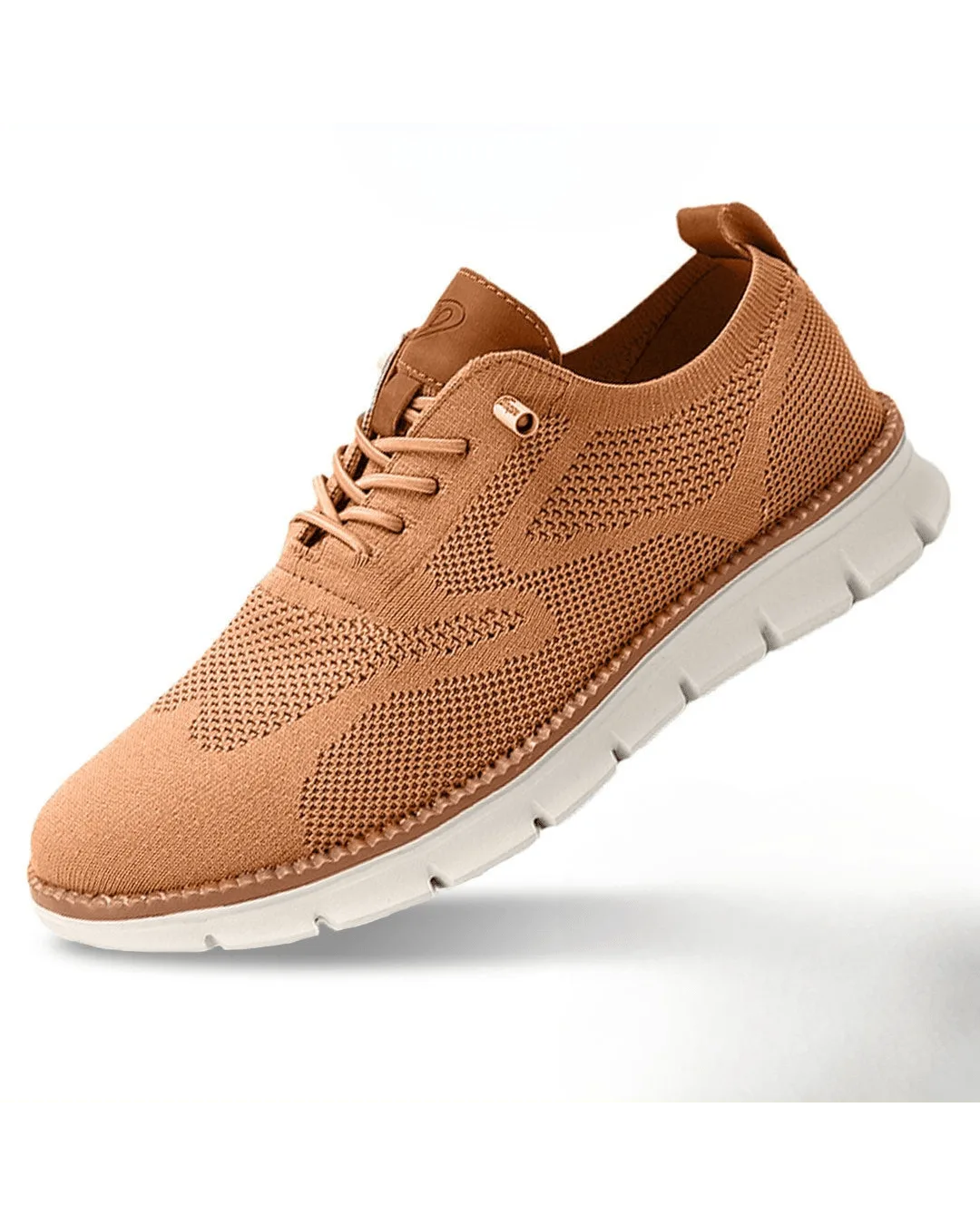 Caramel tan knit sneaker with matching tone leather heel tab and off-white sole