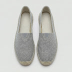 Top-down pair view of grey espadrilles showing woven canvas upper and natural stitched trim