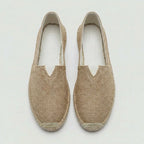 Side view of khaki linen espadrille showing natural woven texture and jute sole wrap