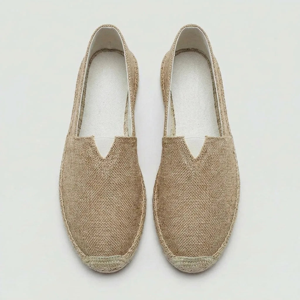 Side view of khaki linen espadrille showing natural woven texture and jute sole wrap