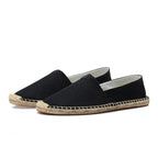 Top-down pair view of khaki linen espadrilles with cream canvas lining visible inside