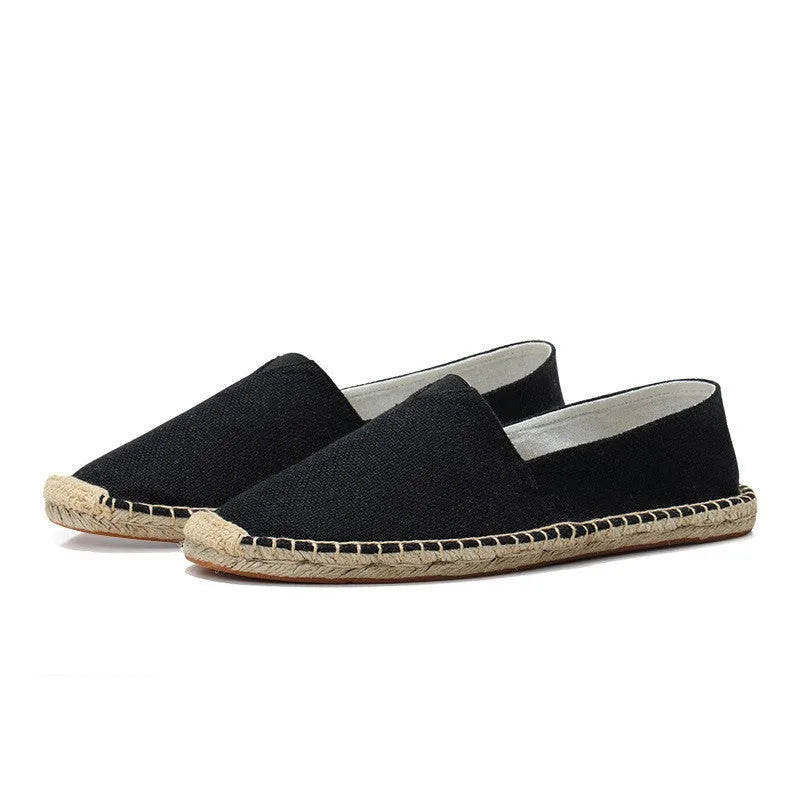 Top-down pair view of khaki linen espadrilles with cream canvas lining visible inside