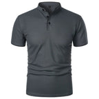 Charcoal grey polo shirt with stand-up collar, black piping detail, front view on white background