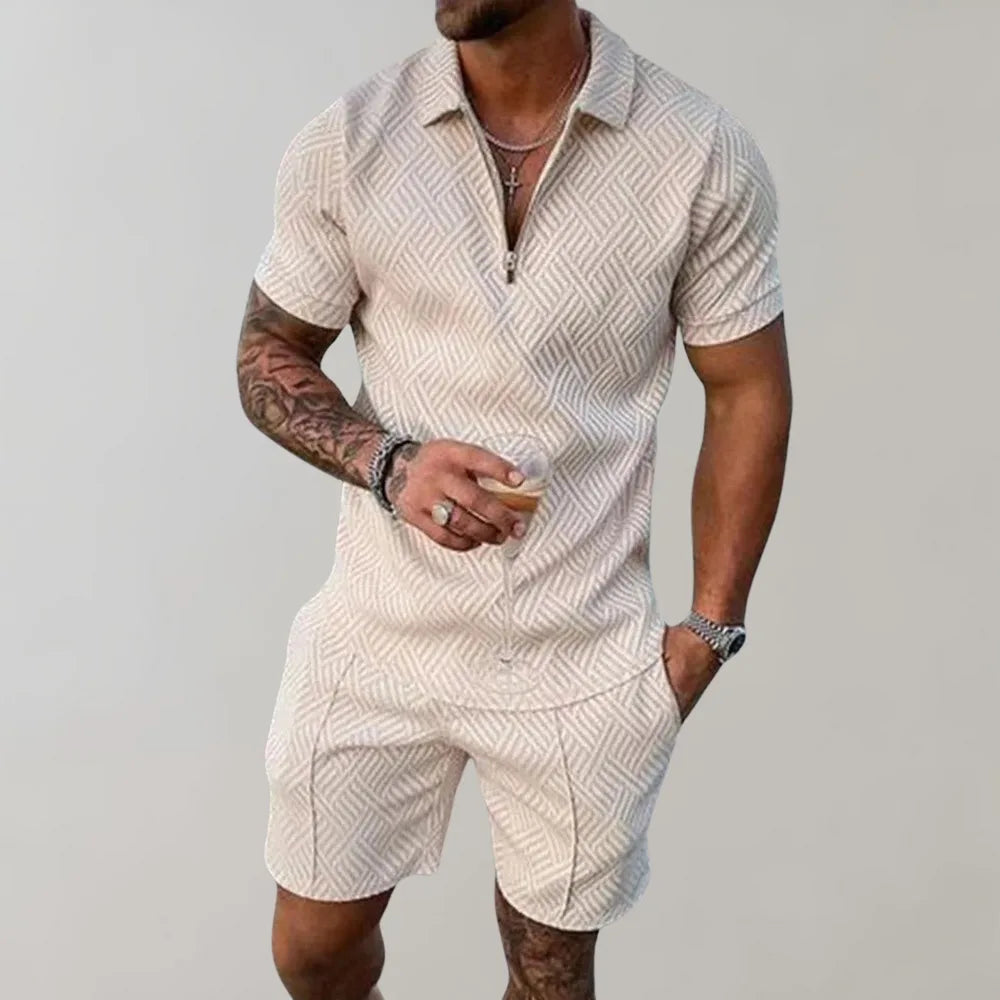Beige textured polo and shorts set worn with a drink in hand, showing the geometric woven pattern