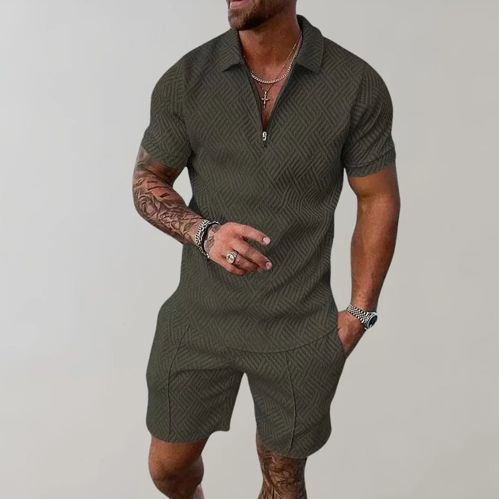 Dark grey textured polo and matching shorts set, side angle showing relaxed regular fit