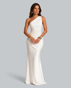 Front view of ivory white one-shoulder satin maxi dress with draped side waist and sleek bodice