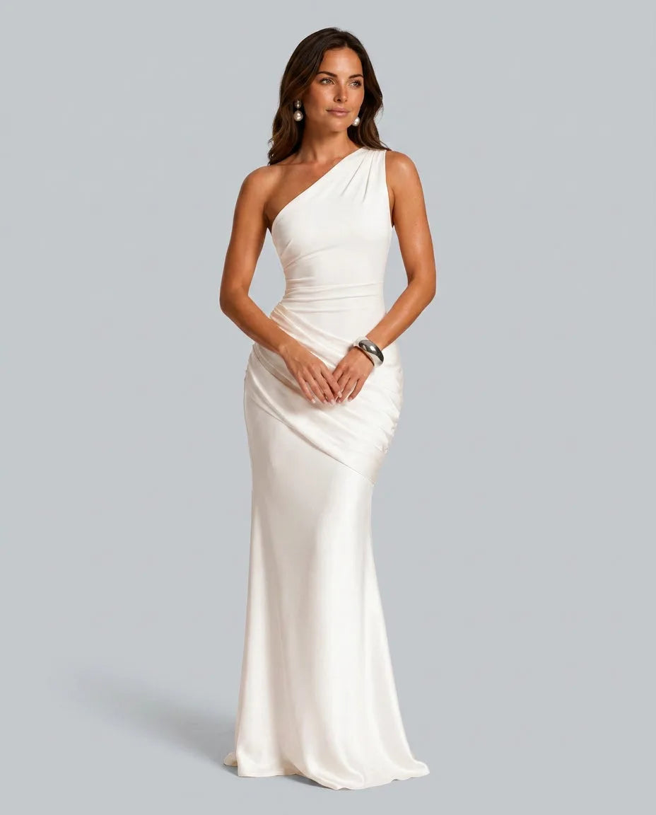 Front view of ivory white one-shoulder satin maxi dress with draped side waist and sleek bodice