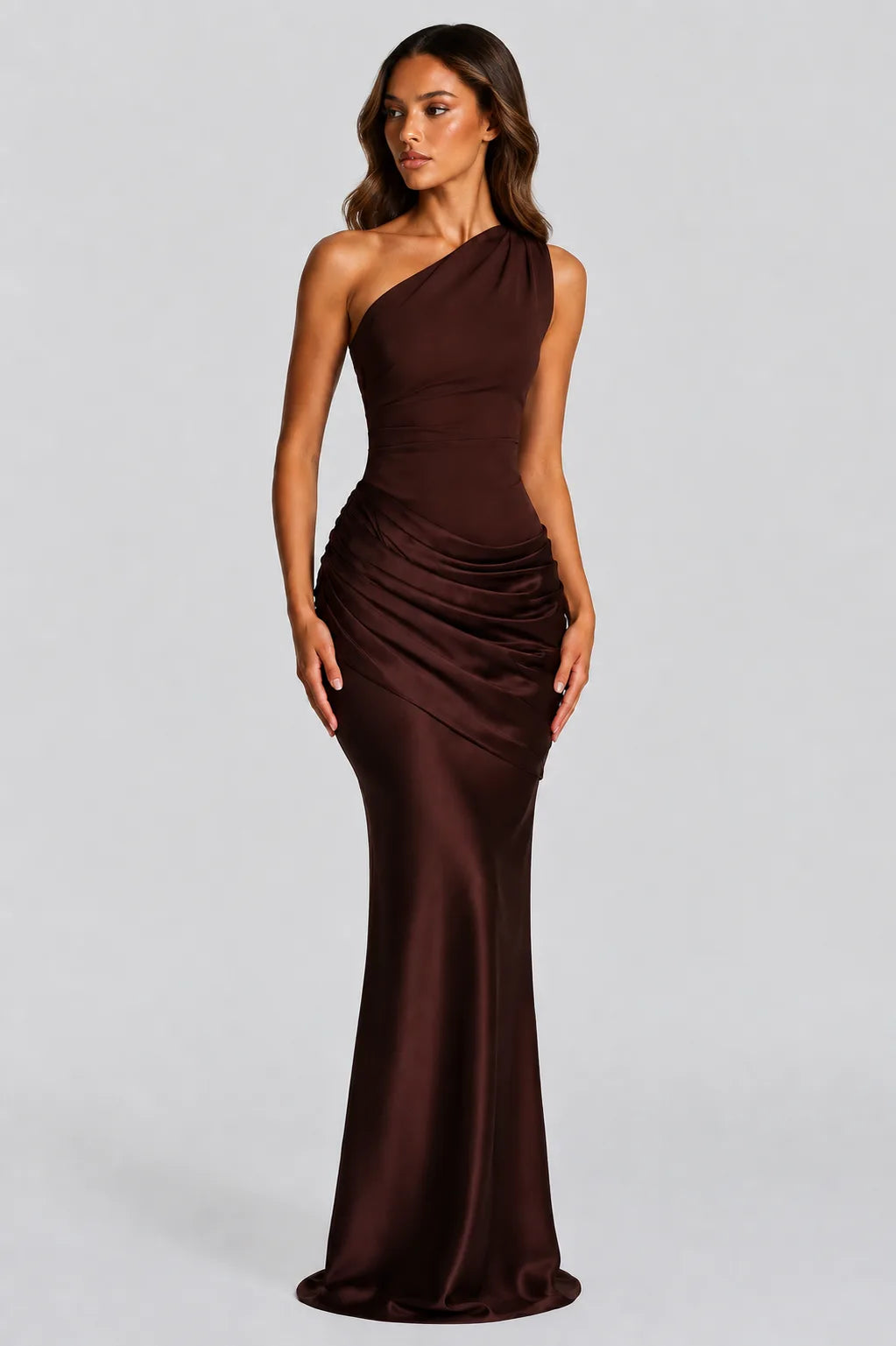 Front view of deep brown one-shoulder satin maxi dress with ruched waist and fitted bodice